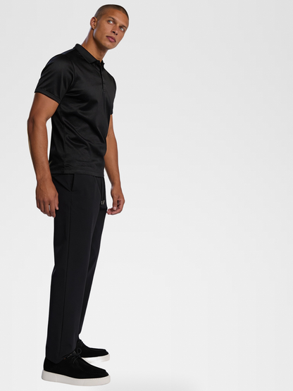 black imperial polo, black urbanpants, black shoe — lightskin_model — 3/4 Side