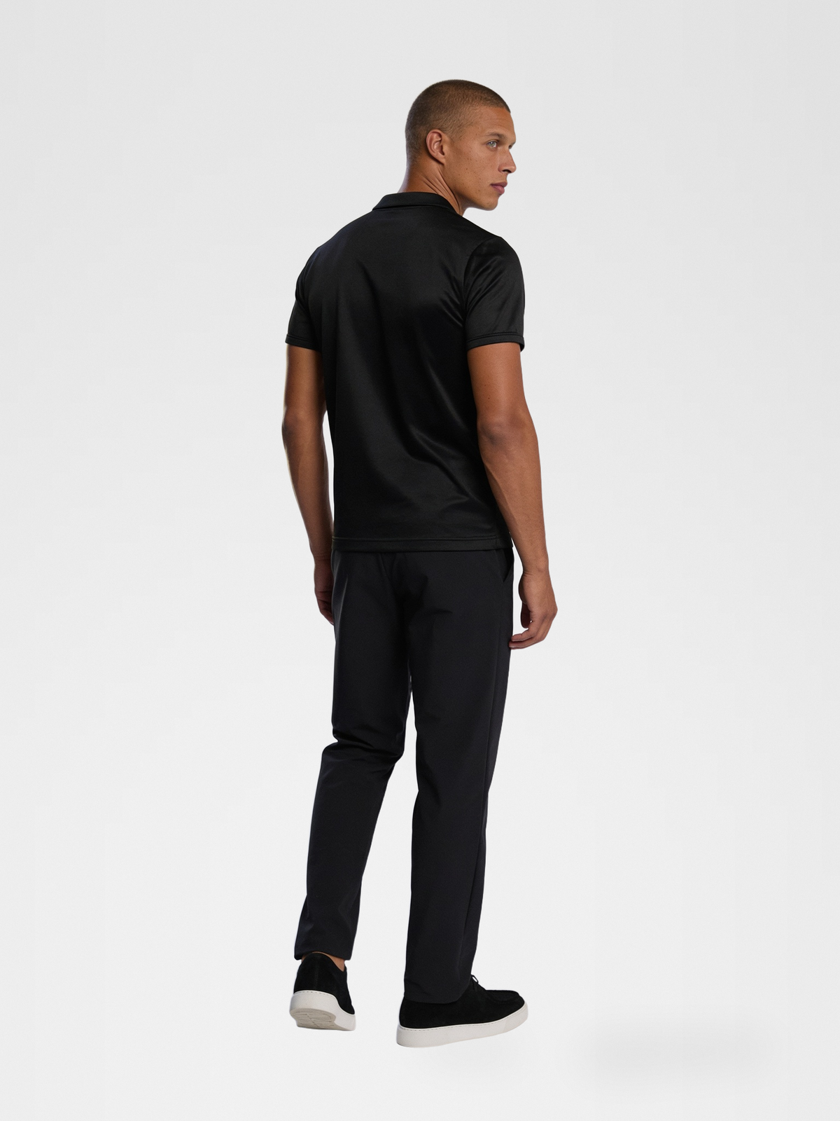 black imperial polo, black urbanpants, black shoe — lightskin_model — Back View