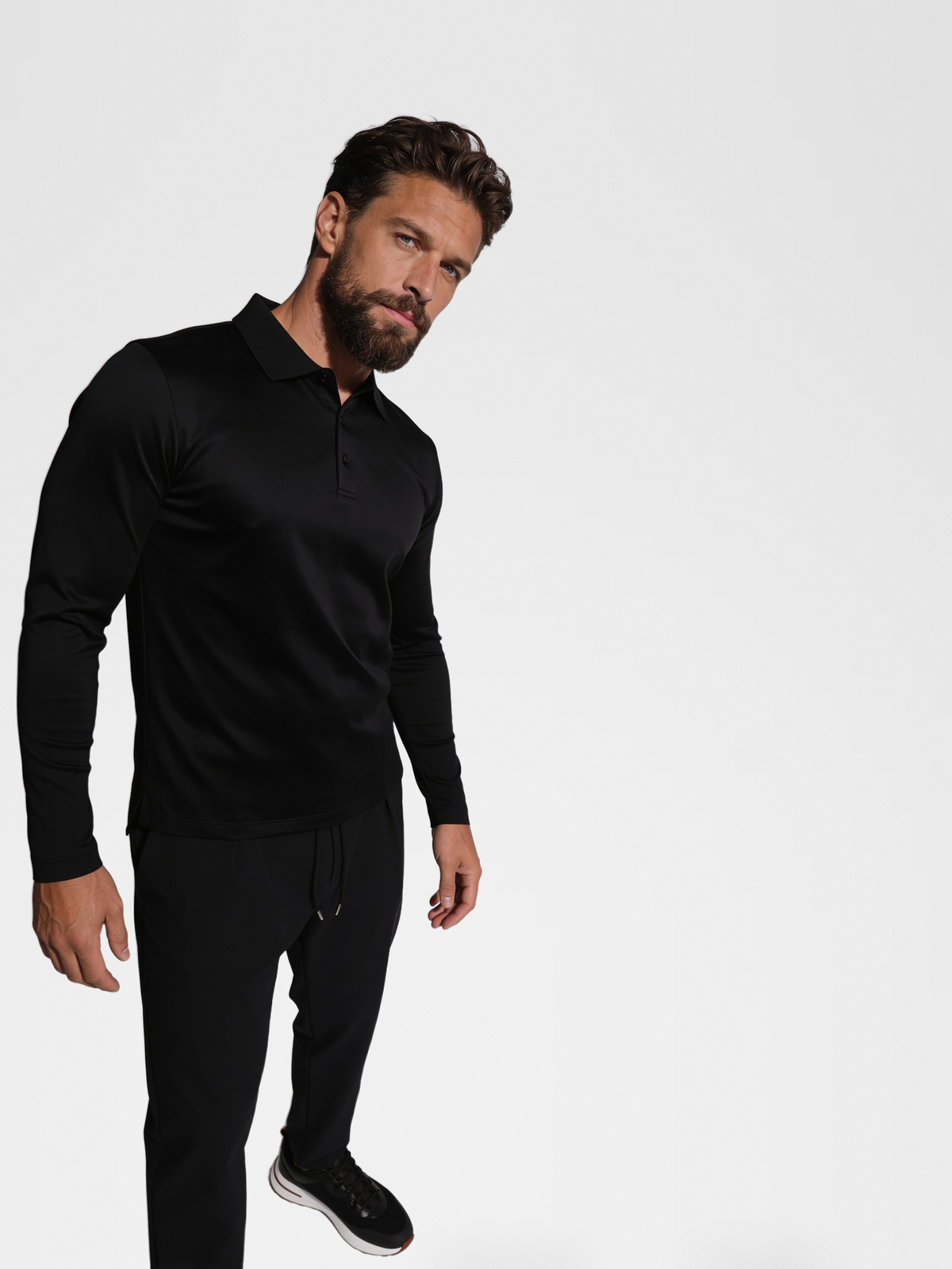 black long sleeve polo, black urbanpants, lp black shoe — luxury_european — 3/4 Side